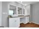 Double vanity bathroom with granite countertop, white cabinets, and lighted mirrors at 5374 Tolar Rd # 79, South Fulton, GA 30213