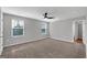 Bedroom with carpet, ceiling fan, and two windows at 5374 Tolar Rd # 79, South Fulton, GA 30213