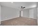 Bedroom with carpet, ceiling fan, and two windows at 5374 Tolar Rd # 79, South Fulton, GA 30213