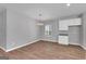 Dining area with hardwood floors and white cabinets at 5374 Tolar Rd # 79, South Fulton, GA 30213