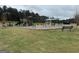 Community playground with swings, slides, and play structures at 5374 Tolar Rd # 79, South Fulton, GA 30213