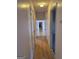 Hallway with hardwood floors and access to bedrooms at 1000 Tanglewood Tl, Woodstock, GA 30189