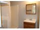 Clean bathroom with a vanity and tiled shower at 126 E Mimosa Dr, Jonesboro, GA 30236