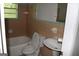 Bathroom with pedestal sink and bathtub at 126 E Mimosa Dr, Jonesboro, GA 30236