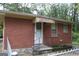Brick house exterior with a small front porch at 126 E Mimosa Dr, Jonesboro, GA 30236