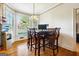 Bright breakfast nook with bay window and wood table at 125 Treebrooke Way, Fayetteville, GA 30214