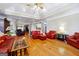 Bright living room featuring hardwood floors and a high ceiling at 125 Treebrooke Way, Fayetteville, GA 30214