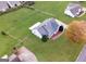 Aerial view showing house, yard, and neighboring properties at 231 Ferguson Ave, Locust Grove, GA 30248