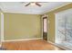 Bright living room featuring hardwood floors and a large window at 2289 Montrose Dr, East Point, GA 30344