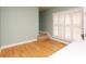 Simple bedroom with hardwood floors and plantation shutters at 2578 Chipping Ct, Villa Rica, GA 30180