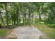 Brick patio with pergola in a wooded setting at 2578 Chipping Ct, Villa Rica, GA 30180