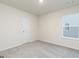 Bright bedroom with neutral walls and carpet at 141 Avondale Blvd, Conyers, GA 30013