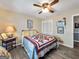 Bright bedroom with a queen-size bed and ample closet space at 1349 Highway 81 E, Mcdonough, GA 30252