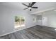 Dining area with vinyl plank floors and sliding glass doors to deck at 944 Se Woodland Ave, Atlanta, GA 30316