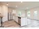 Modern kitchen with white cabinets, granite countertops and island at 111 Avondale Blvd, Conyers, GA 30013