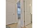 Hallway with doors to bedrooms and bathroom at 371 Caledonia N Ct, Peachtree City, GA 30269