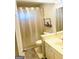 Clean bathroom with shower/tub, sink, and vanity at 2530 Lockemeade Way, Lawrenceville, GA 30043