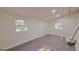 Bright bonus room with wood-look flooring and a view of the backyard at 601 Melrose Dr, Forest Park, GA 30297