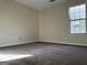 Spacious carpeted bedroom with a window at 962 Spruce Pt, Jonesboro, GA 30238