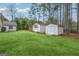 Large backyard with detached storage shed at 120 Riverside Ct, Sharpsburg, GA 30277