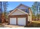 View of a two car garage at 4499 Lombard Rd, Ellenwood, GA 30294