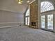 Spacious Gathering room with stone fireplace and access to deck at 3239 Talimore Cir, Marietta, GA 30066