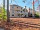 Two story house exterior with deck and surrounding trees at 3239 Talimore Cir, Marietta, GA 30066