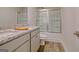 Bathroom with granite countertop and walk-in shower at 205 Weldon Rd # 44, Mcdonough, GA 30253