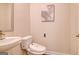Modern bathroom with white sink, toilet and gray tile floor at 205 Weldon Rd # 44, Mcdonough, GA 30253