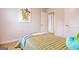 Cozy bedroom with twin bed and access to hallway at 205 Weldon Rd # 44, Mcdonough, GA 30253