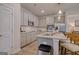 Modern kitchen with granite countertops, stainless steel appliances, and gray cabinets at 205 Weldon Rd # 44, Mcdonough, GA 30253