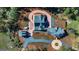 Overhead view of house, detached garage, and driveway at 242 Kirkley Rd, Tyrone, GA 30290