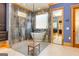 Modern bathroom with walk-in shower and soaking tub at 242 Kirkley Rd, Tyrone, GA 30290