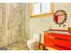 Bathroom with walk-in shower and red vanity at 242 Kirkley Rd, Tyrone, GA 30290
