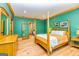Bright bedroom with wood floors and teal walls at 242 Kirkley Rd, Tyrone, GA 30290