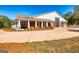 House exterior with a large garage and a long driveway at 242 Kirkley Rd, Tyrone, GA 30290