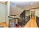 Upper hallway overlooking the living area at 242 Kirkley Rd, Tyrone, GA 30290
