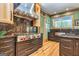 Modern kitchen with a professional range and dark green marble countertops at 242 Kirkley Rd, Tyrone, GA 30290