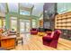Spacious living room with a marble fireplace and built-in shelves at 242 Kirkley Rd, Tyrone, GA 30290