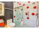 Large walk-in shower with red diamond tile accents at 242 Kirkley Rd, Tyrone, GA 30290