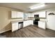 Renovated kitchen, featuring white cabinets and granite countertops at 2798 Engle Nw Rd, Atlanta, GA 30318