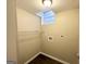 Basement laundry room with shelving at 2798 Engle Nw Rd, Atlanta, GA 30318