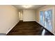 Living room with hardwood floors and sliding glass doors to a patio at 2798 Engle Nw Rd, Atlanta, GA 30318