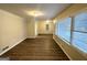 Bright living room featuring hardwood floors and large windows at 2798 Engle Nw Rd, Atlanta, GA 30318