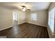 Bright living room with hardwood floors and access to other rooms at 3568 Glenview Cir, Atlanta, GA 30331