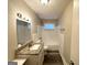 Updated bathroom with granite vanity, bathtub, and new flooring at 2302 Montrose Dr, East Point, GA 30344