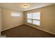 Spacious bedroom with neutral walls and carpet at 2302 Montrose Dr, East Point, GA 30344