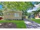 Brick ranch home with carport and landscaped lawn at 2302 Montrose Dr, East Point, GA 30344
