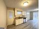 Updated kitchen with white cabinets and granite counters at 2302 Montrose Dr, East Point, GA 30344