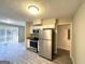 Stainless steel appliances and granite countertops in kitchen at 2302 Montrose Dr, East Point, GA 30344